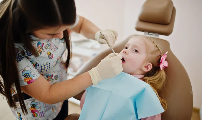 child receiving gentle restorative dental care